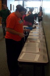 Students getting the first chance to sign up for this semester's workshops and clases.