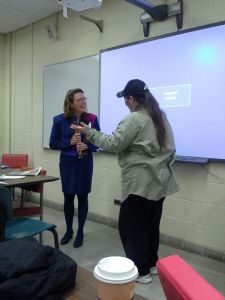 Ellen presenting a gift of appreciation to Donna Rae Sutherland