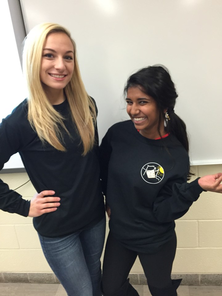 Fashion Design student Jocelyn Eade pictured with  her fabulous t-shirt design and Fashion Merchandising student Lekha Anderson. 
