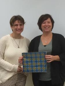 Giving Tanya our GCC plaid as a thank you for coming into class.